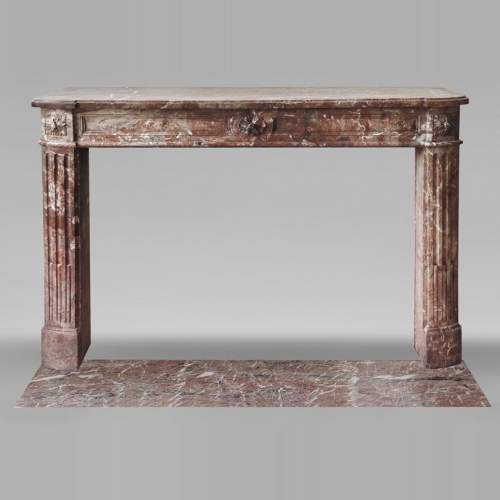 Louis XVI period fireplace in red northern marble, slightly curved