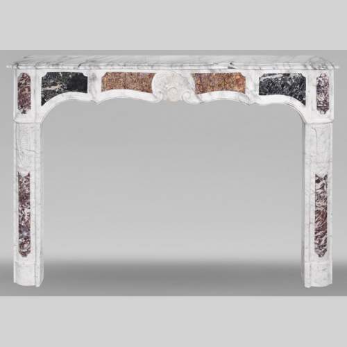 Provençal-style fireplace in veined Carrara marble and colored marble