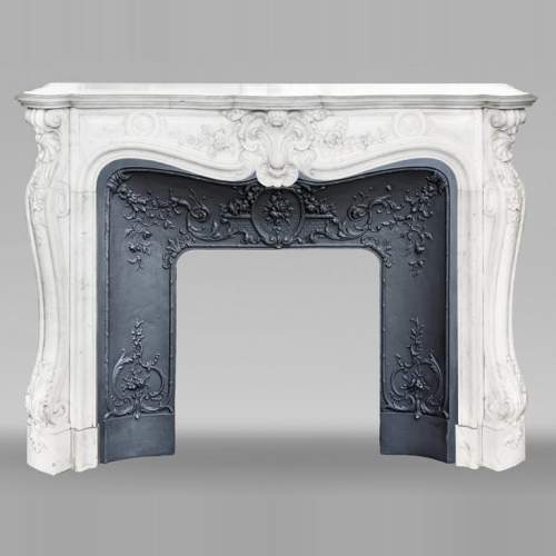 Highly sculpted Louis XV style fireplace in Carrara marble