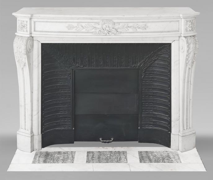 Curved Louis XVI style fireplace with beaded decoration, in semi-statuary marble. Curved Louis XVI style fireplace with beaded decoration, in semi-statuary marble.-0