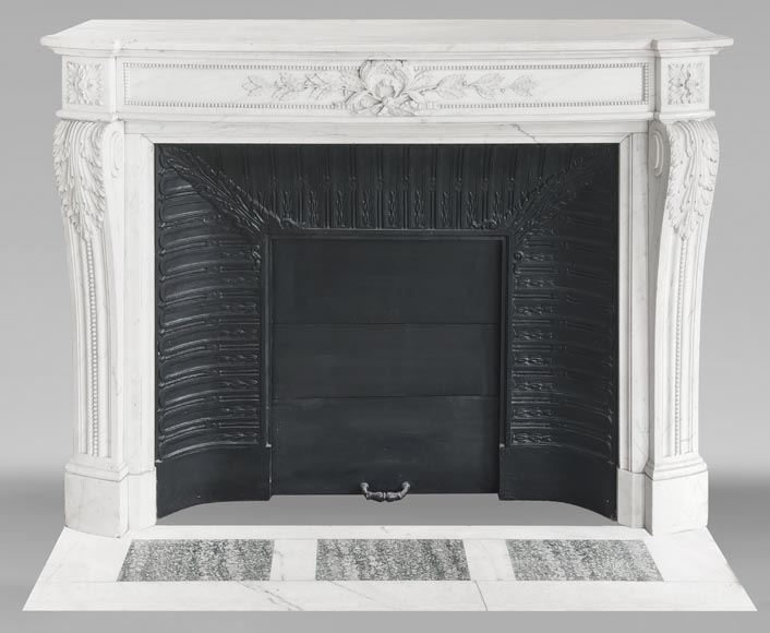 Curved Louis XVI style fireplace with beaded decoration, in semi-statuary marble.-0