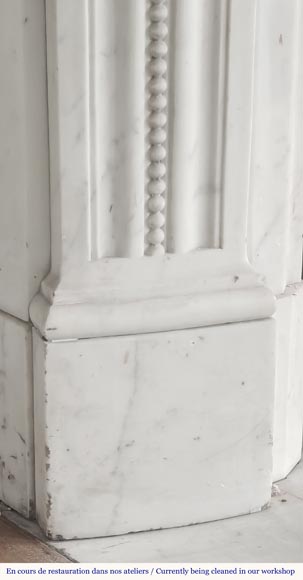 Curved Louis XVI style fireplace with beaded decoration, in semi-statuary marble.-7