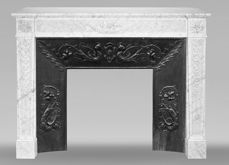 Louis XVI period fireplace with carved fruit decoration, in veined Carrara marble-0