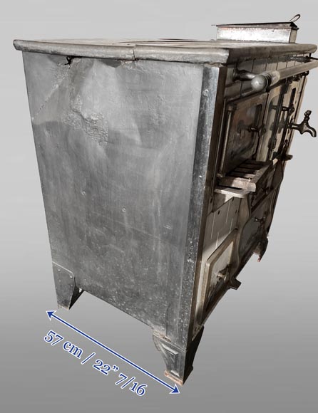 Cast-iron stove with faience imitation and snowy landscape decoration Cast-iron stove with faience imitation and snowy landscape decoration-5