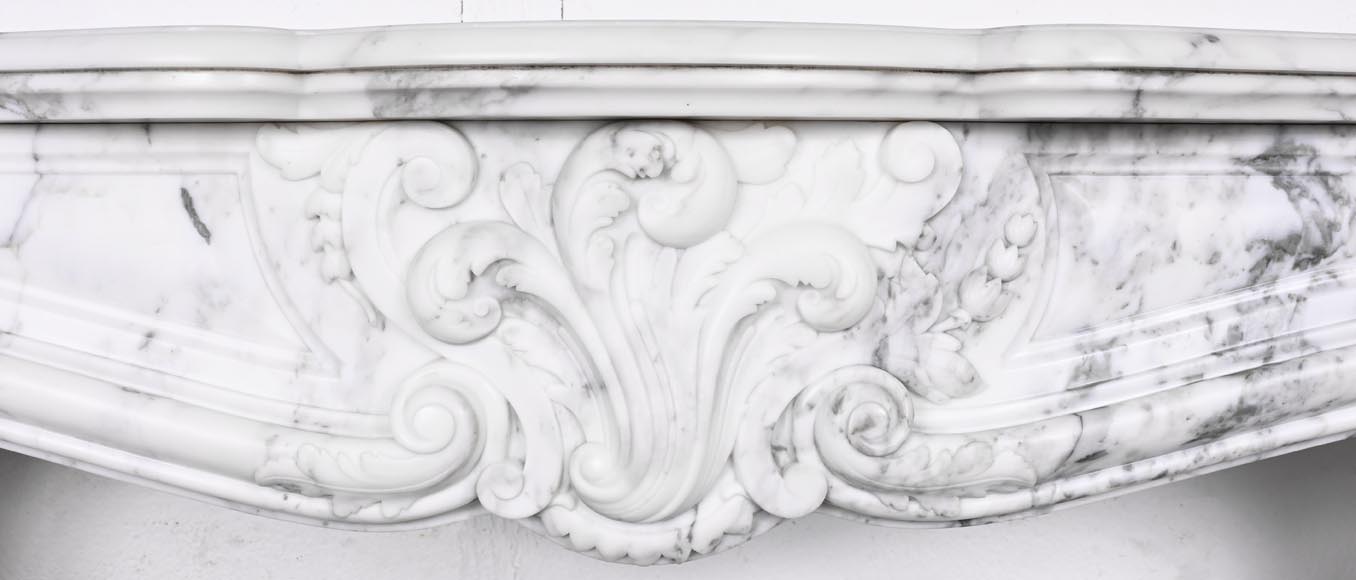 Louis XV style fireplace in Arabescato marble, decorated with an asymmetrical palmette Louis XV style fireplace in Arabescato marble, decorated with an asymmetrical palmette-1