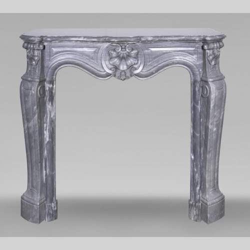 Small Louis XV style fireplace decorated with a shell, in blue Turquin marble