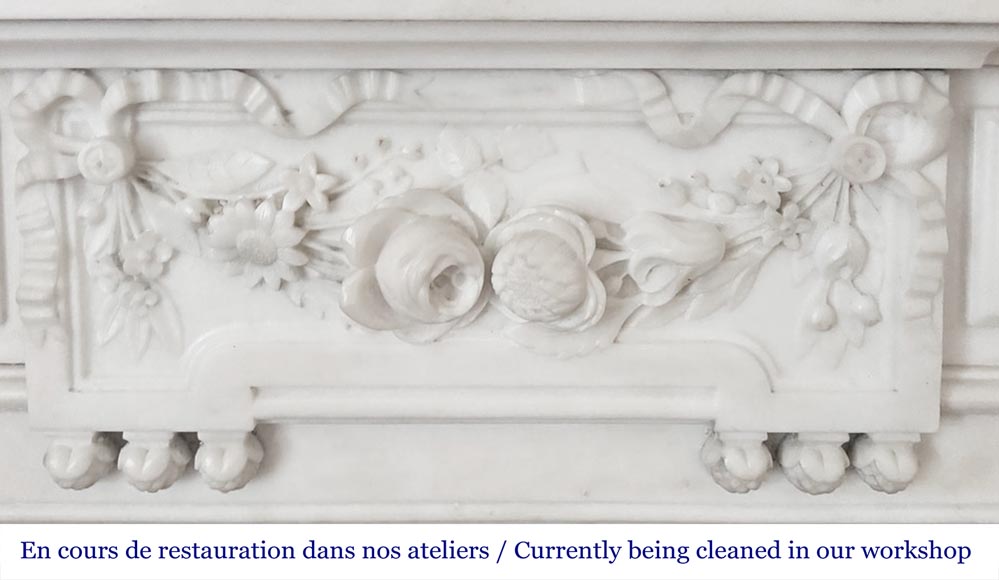 Louis XVI style fireplace with half-column and floral garland, in semi-statuary marble Louis XVI style fireplace with half-column and floral garland, in semi-statuary marble-1