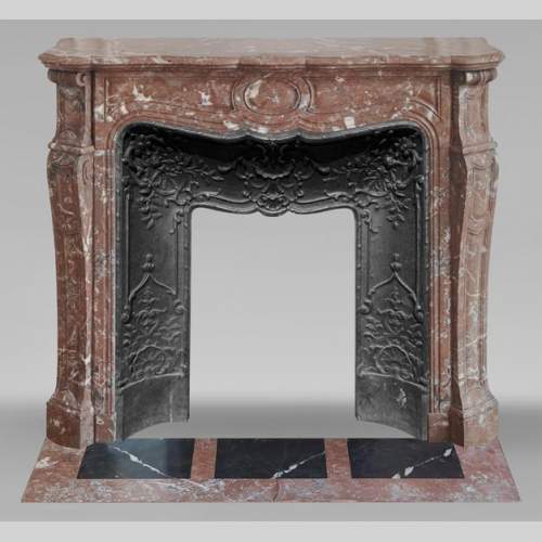 Louis XV style Pompadour model fireplace, in Rouge du Nord marble