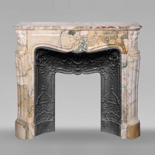 Louis XV style fireplace with three shells in Médou breccia