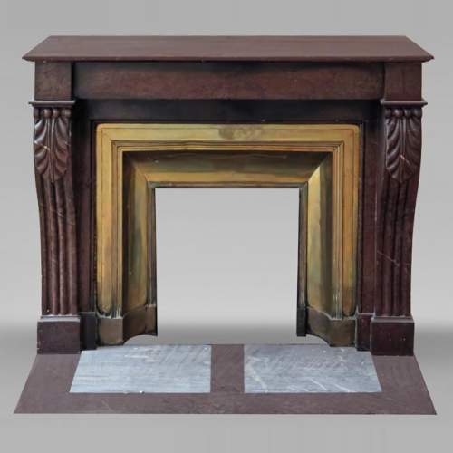 Napoleon III style fireplace in griotte marble with a brass interior