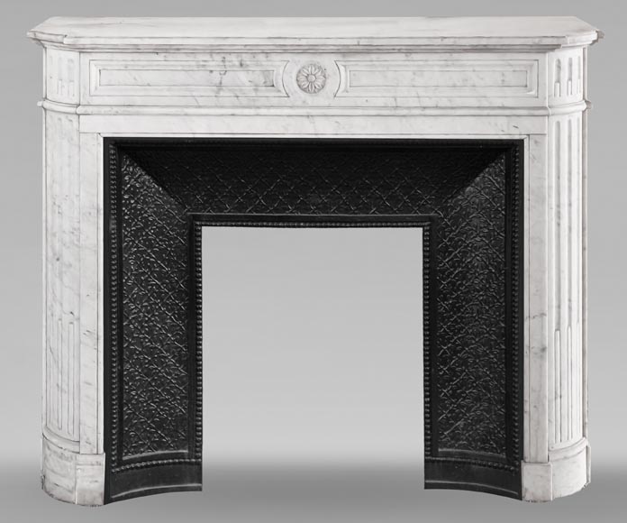 Louis XVI style fireplace with rounded corners and sunflower motif, in Carrara marble Louis XVI style fireplace with rounded corners and sunflower motif, in Carrara marble-0