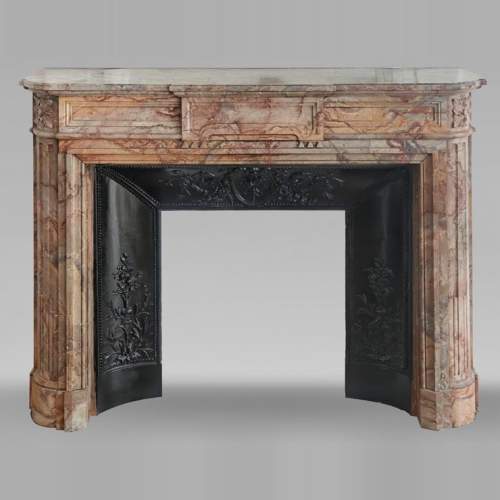 Louis XVI style fireplace with rounded corners in colored marble