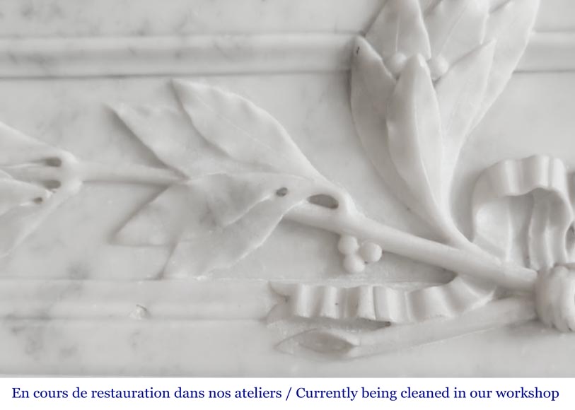Louis XVI style fireplace with rounded corners and decorated with a laurel wreath, in Carrara marble-3