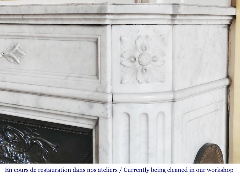 Louis XVI style fireplace with rounded corners and decorated with a laurel wreath, in Carrara marble-8