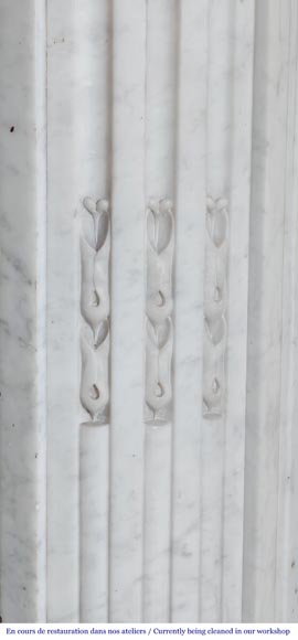 Louis XVI style fireplace with rounded corners and decorated with a laurel wreath, in Carrara marble-10