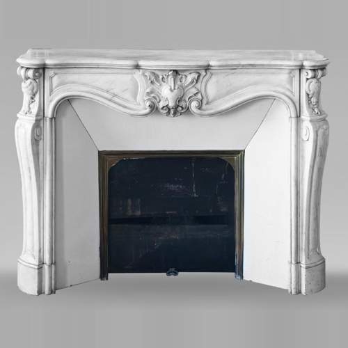 Louis XV style fireplace in Carrara marble