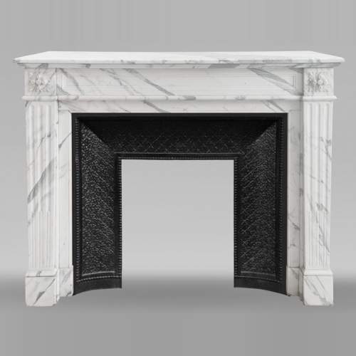 Louis XVI style fireplace with arabesque marble molding