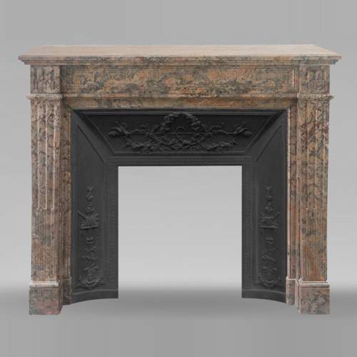 Louis XVI style fireplace with fluted feet, in pink Enjugerais marble