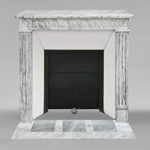 Louis XVI style molded fireplace in veined Carrara marble
