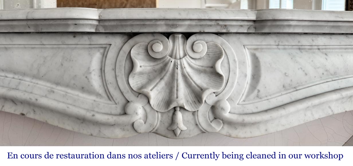 Louis XV style fireplace in Carrara marble, decorated with a shell Louis XV style fireplace in Carrara marble, decorated with a shell-1