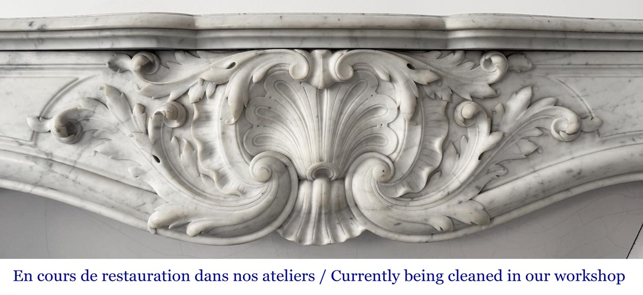 Louis XV style fireplace adorned with a large shell Louis XV style fireplace adorned with a large shell-1