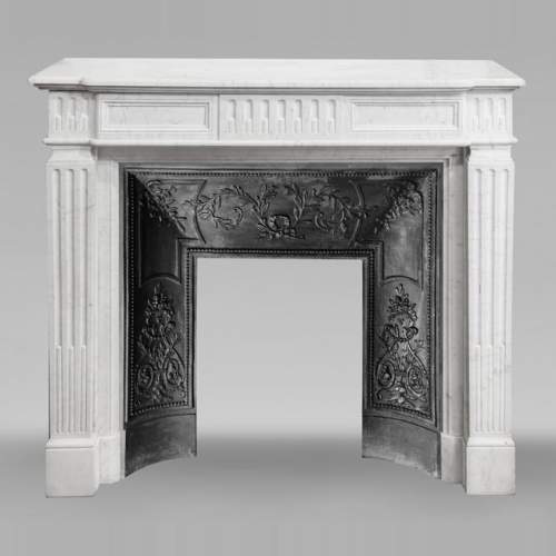Louis XVI style fireplace in Carrara marble, decorated with fluting