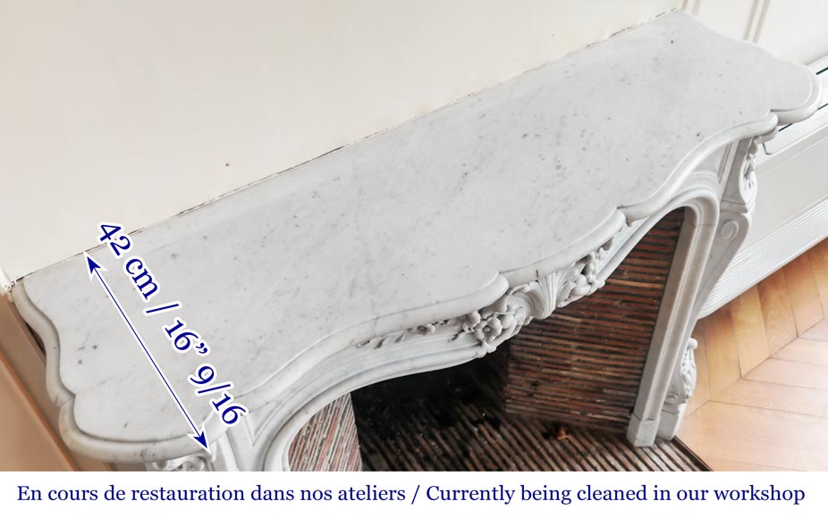 Louis XV style fireplace in Carrara marble, with richly sculpted floral decoration-11