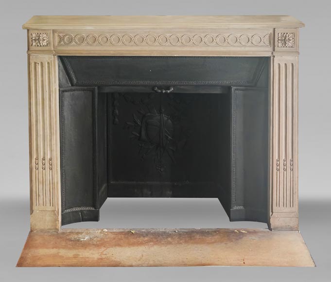 Louis XVI style fireplace decorated with a Greek key frieze-0