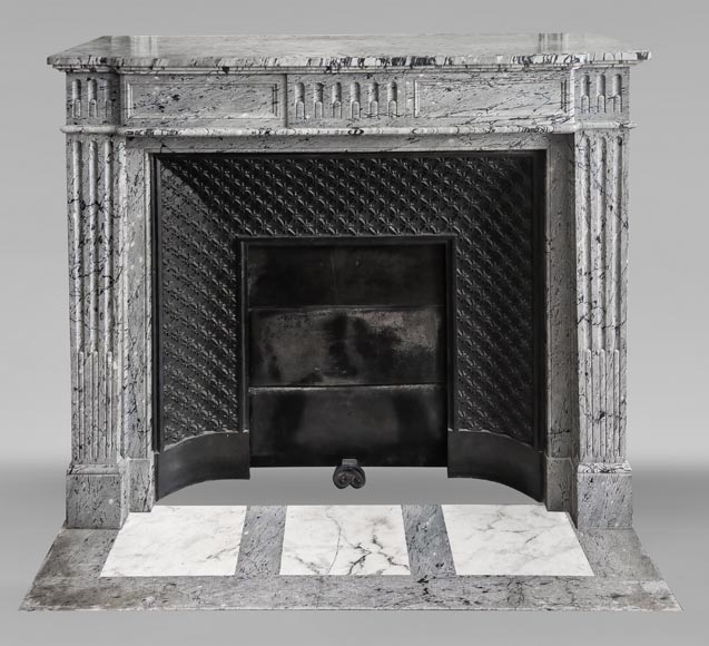  Louis XVI-style fireplace in blue fleuri marble, featuring fluted decoration-0