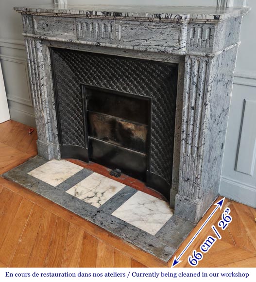  Louis XVI-style fireplace in blue fleuri marble, featuring fluted decoration-4