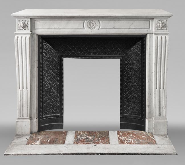 Louis XVI style fireplace in Carrara marble, decorated with a flower Louis XVI style fireplace in Carrara marble, decorated with a flower-0