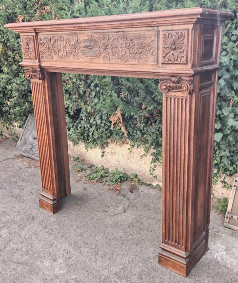 Louis XVI style oak fireplace, decorated with an oak-leaf frieze and surmounted by its oak overmantel-8