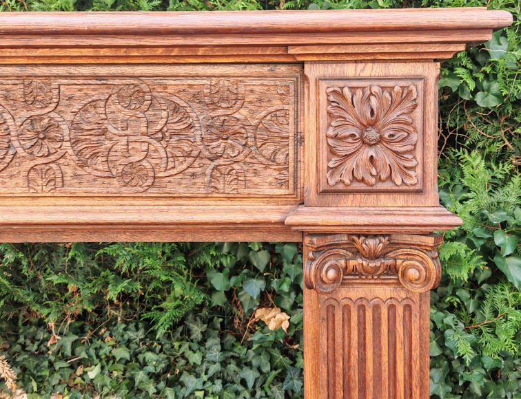 Louis XVI style oak fireplace, decorated with an oak-leaf frieze and surmounted by its oak overmantel-9