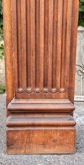 Louis XVI style oak fireplace, decorated with an oak-leaf frieze and surmounted by its oak overmantel-10