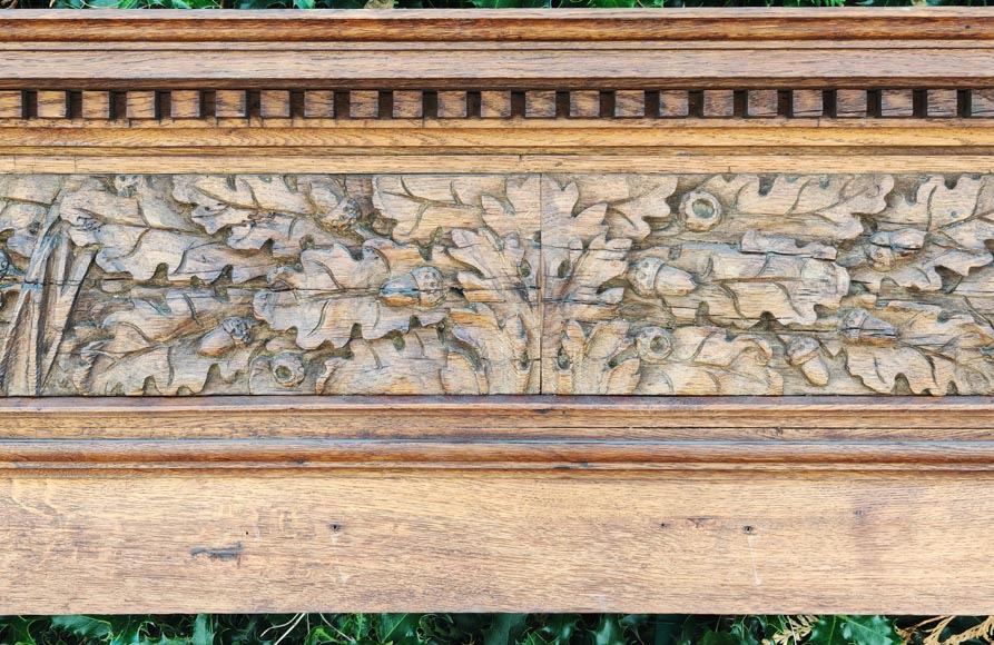 Louis XVI style oak fireplace, decorated with an oak-leaf frieze and surmounted by its oak overmantel-13