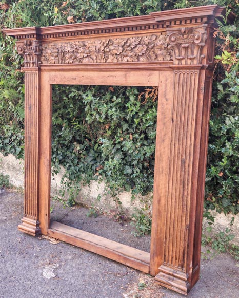Louis XVI style oak fireplace, decorated with an oak-leaf frieze and surmounted by its oak overmantel-16