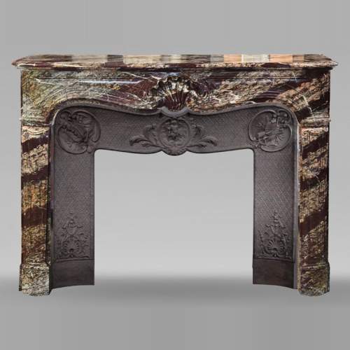 Louis XV style fireplace in Campan marble, decorated with a shell motif