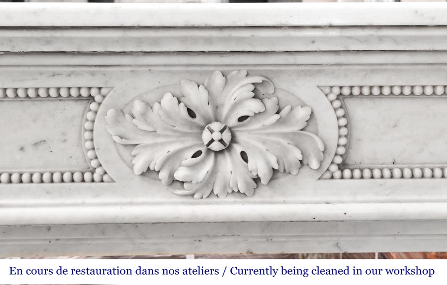 Carrara marble Louis XVI-style fireplace with bead-and-reel ornamentation-1