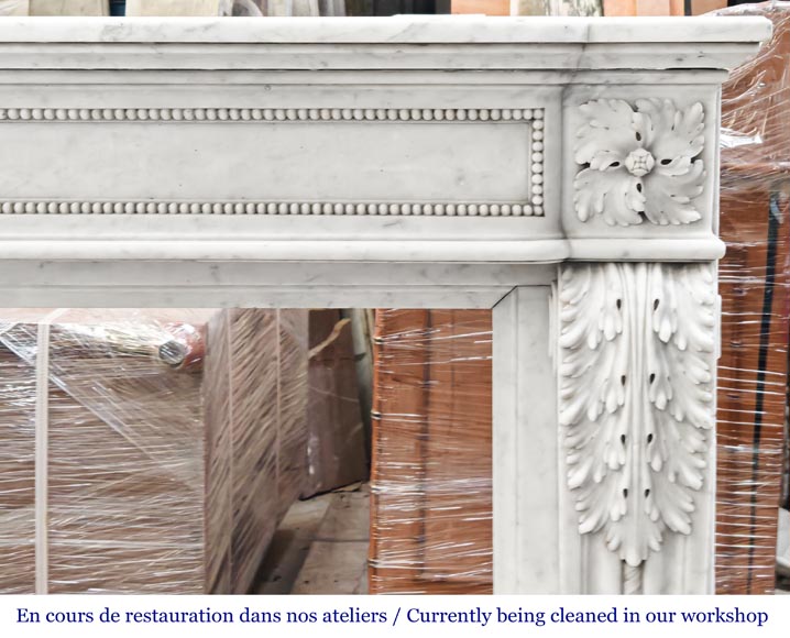 Carrara marble Louis XVI-style fireplace with bead-and-reel ornamentation-9