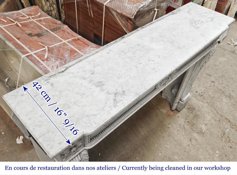 Carrara marble Louis XVI-style fireplace with bead-and-reel ornamentation-12
