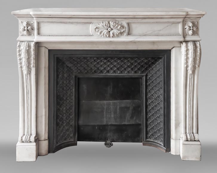 Louis XVI-style statuary marble fireplace featuring acanthus leaf and bead-and-reel motifs-0