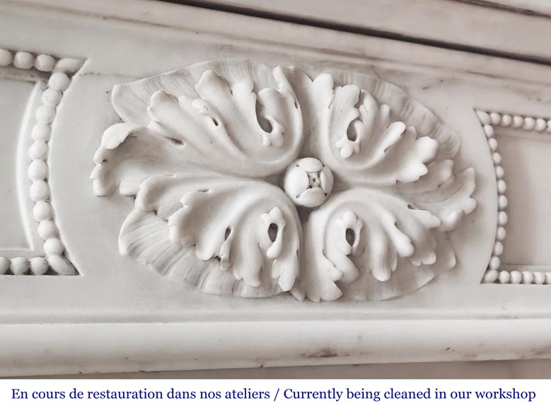 Louis XVI-style statuary marble fireplace featuring acanthus leaf and bead-and-reel motifs-2