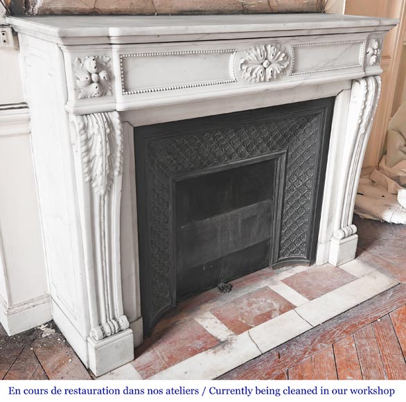 Louis XVI-style statuary marble fireplace featuring acanthus leaf and bead-and-reel motifs-3