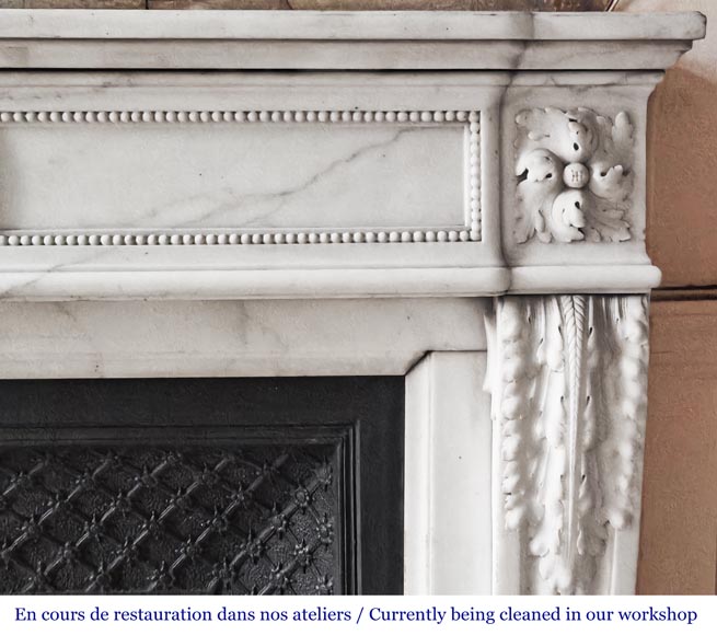 Louis XVI-style statuary marble fireplace featuring acanthus leaf and bead-and-reel motifs-8
