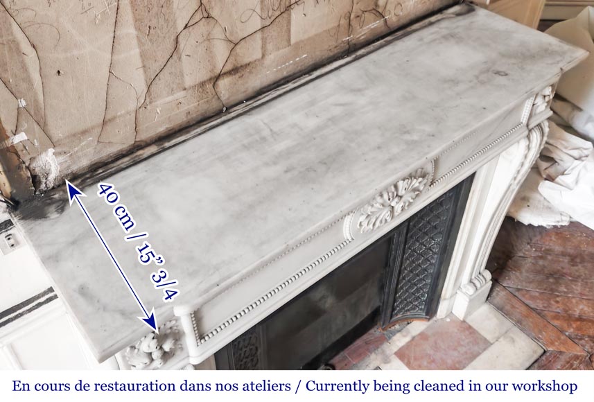 Louis XVI-style statuary marble fireplace featuring acanthus leaf and bead-and-reel motifs-11