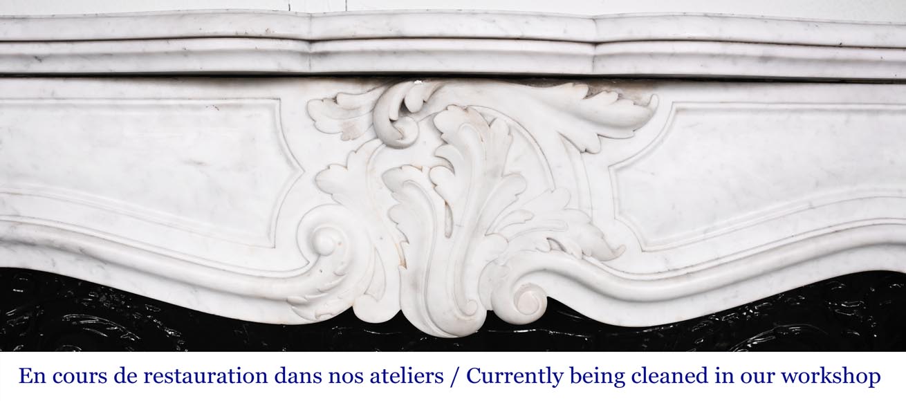 Louis XV-style fireplace in Carrara marble, featuring an asymmetrical palmette motif-1