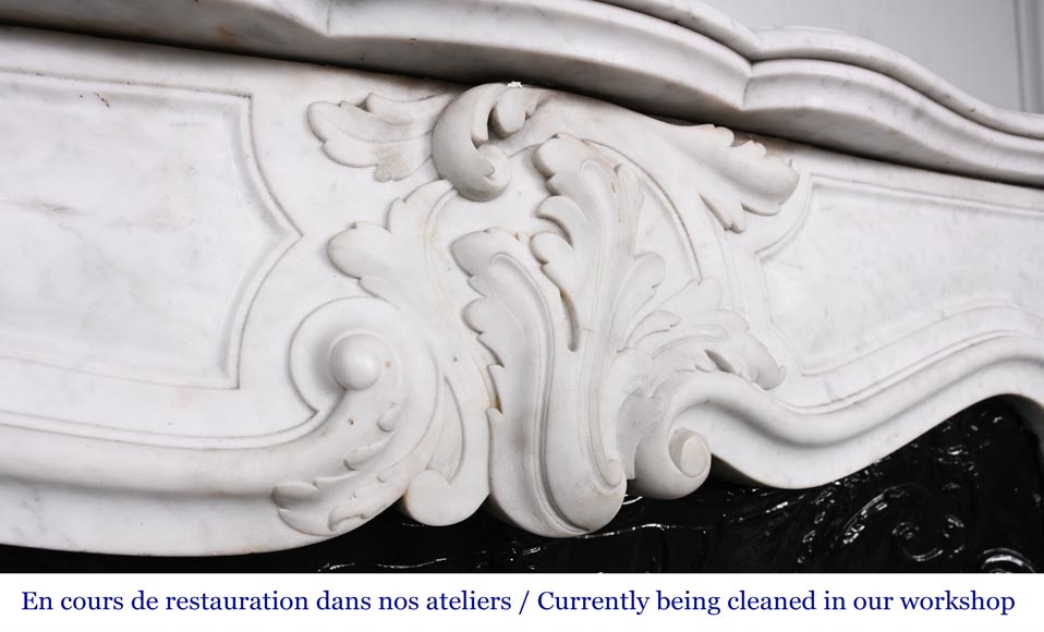 Louis XV-style fireplace in Carrara marble, featuring an asymmetrical palmette motif-2