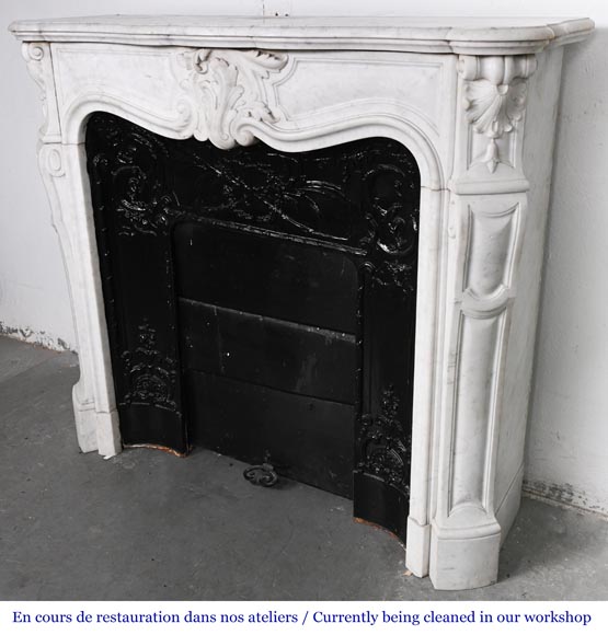Louis XV-style fireplace in Carrara marble, featuring an asymmetrical palmette motif-8