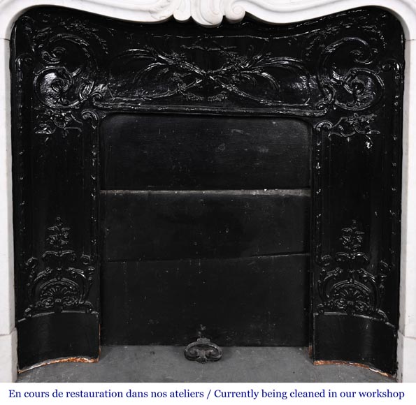 Louis XV-style fireplace in Carrara marble, featuring an asymmetrical palmette motif-11