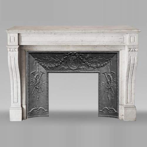 Napoleon III-style fireplace with corbel-like detailing, in Carrara marble